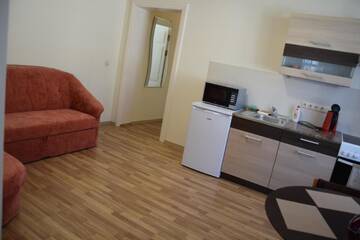 Фото номера Апартаменты с 1 спальней Апартаменты Laureta apartments г. Цесис 16