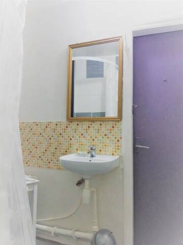 Фото номера Апартаменты с 2 спальнями Апартаменты Old Town Apartments г. Цесис 20